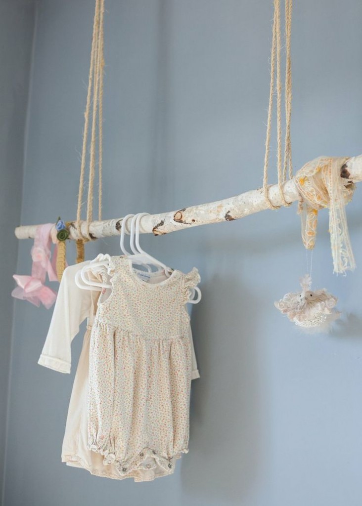dresses hung from a branch apartment therapy