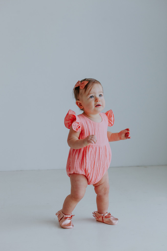 Our Favorite First Birthday Photoshoot Outfit Picks // pink bubble romper