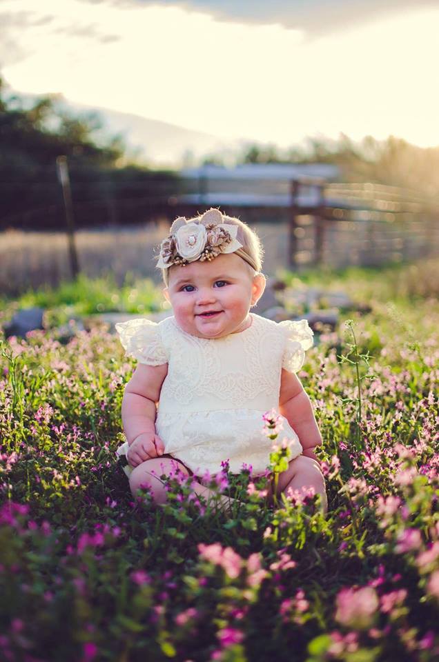 Our Favorite First Birthday Photoshoot Outfit Picks // Ivory lace bubble romper