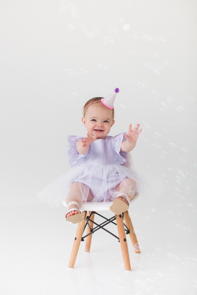 Our Favorite First Birthday Photoshoot Outfit Picks // Purple tutu bubble romper