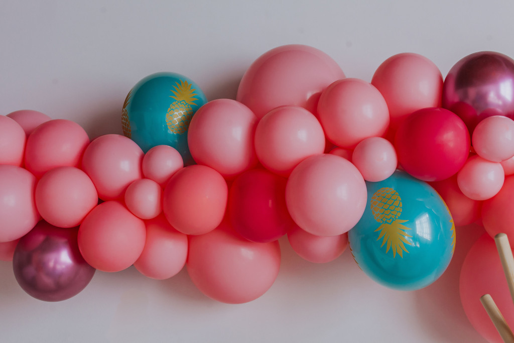 pink and turquoise balloons for a flamingo pineapple party