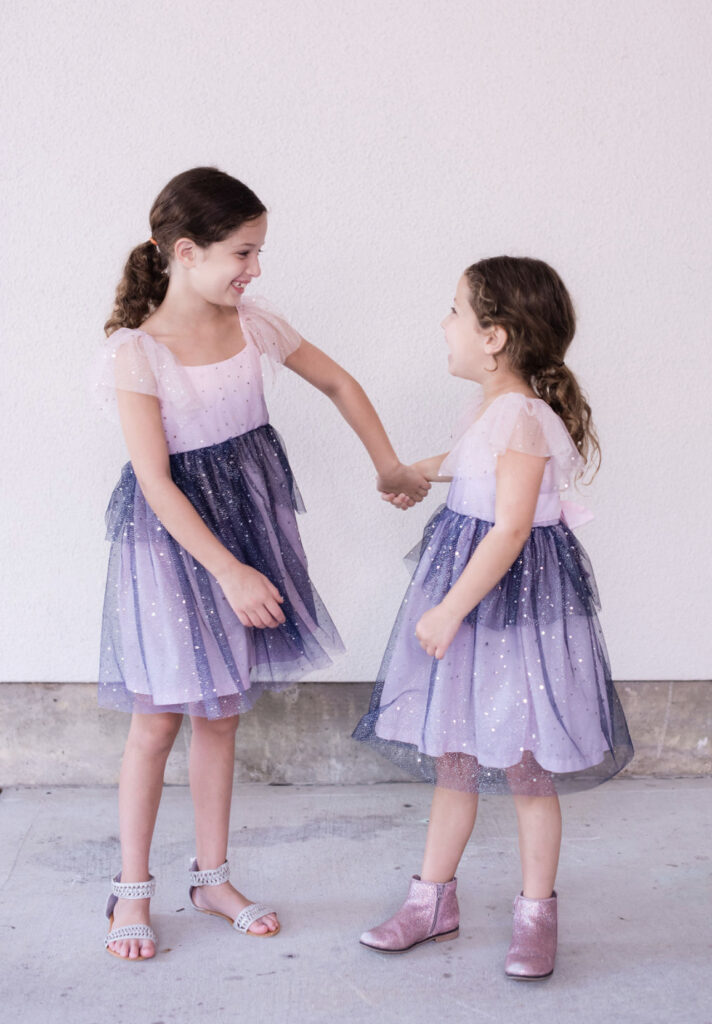 little girls pink and navy peplum tulle dress