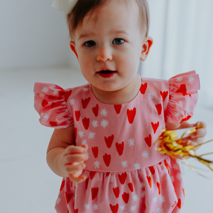 Ettie pink heart bubble romper, the perfect pink romper for Valentine's Day for baby girls