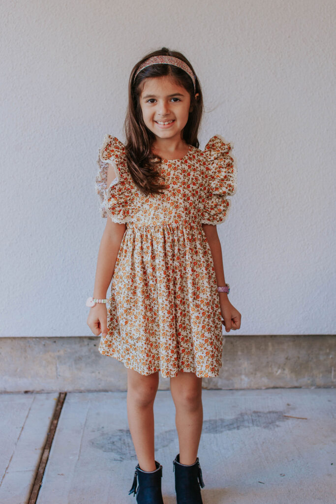 little girls orange and gold ditsy print floral pinafore dress