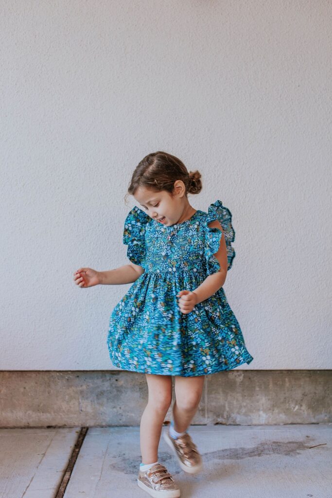 little girls blue and yellow ditsy floral print flutter sleeve pinafore dress