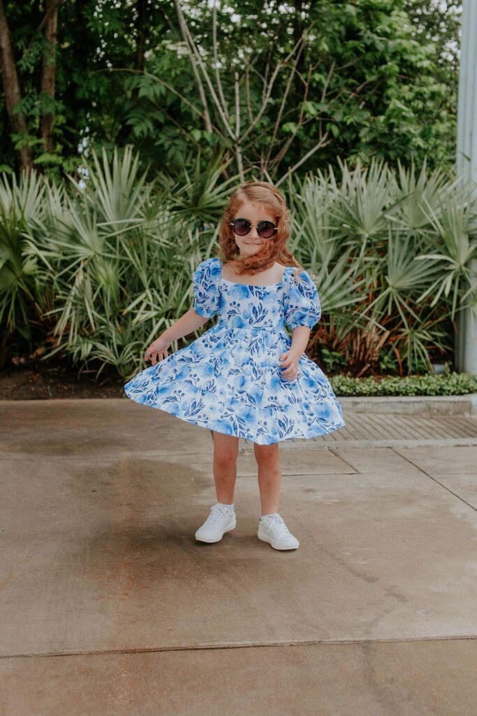 little girls blue floral peasant dress with puff sleeves