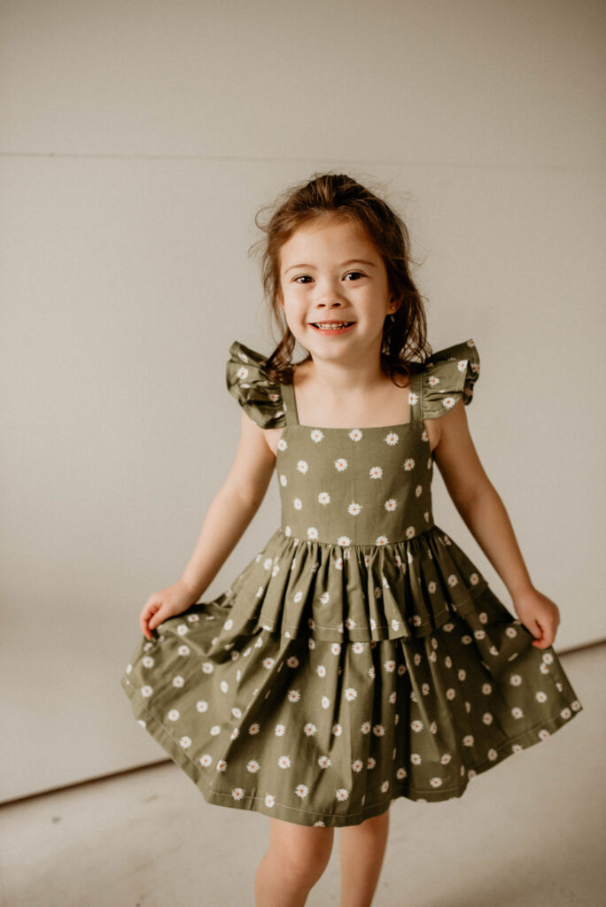 girls olive daisy print peplum dress with flutter sleeves